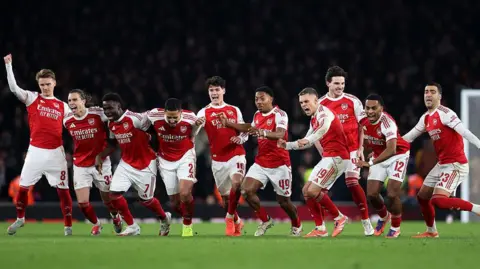 Arsenal celebrate beating Crystal Palace