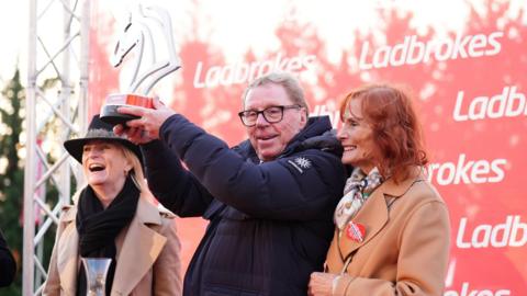 Harry Redknapp and Sandra Harris celebrate after their horse The Jukebox Man wins the King George VI Chase ridden by Jockey Ben Jones during day one of the Christmas Festival at Kempton Park Racecourse
