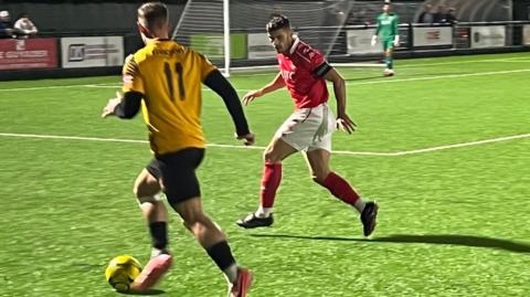 Action from Jersey Bulls v Three Bridges