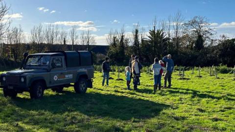 Guernsey Trees For Life planting trees at one of their sites