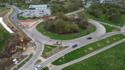 A drone shot of the Ennerdale roundabout. Roadworks can be seen taking place on part of the roundabout. 