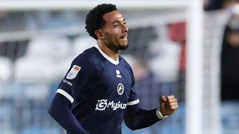 Femi Azeez celebrates