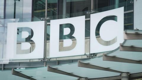 A view of the BBC logo outside of New Broadcasting House 
