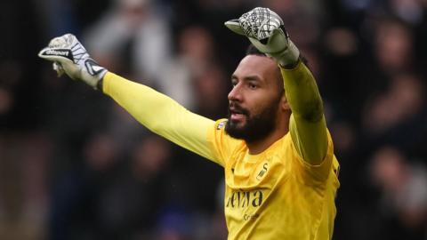 Lawrence Vigouroux celebrates Swansea's win over Bristol City 