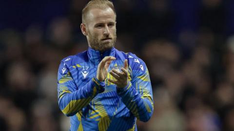 Sheffield Wednesday captain Barry Bannan applauds fans after Tuesday's defeat by Birmingham