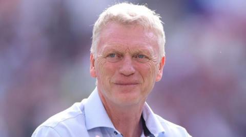 David Moyes smiles during a West Ham game against Luton