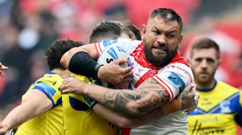 Jared Waerea-Hargreaves of Hull KR is tackled