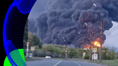 An explosion and large fire is seen at an oil depot with BBC Verify branding.