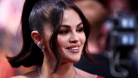 US singer and actor Selena Gomez gives an interview on the red carpet upon arrival to attend the Gala screening of "Emilia Perez" at the Royal Festival Hall, during the 2024 BFI London Film Festival in London, on October 11, 2024