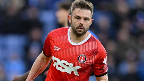 Charlton Athletic striker Matt Godden in red Charlton shirt