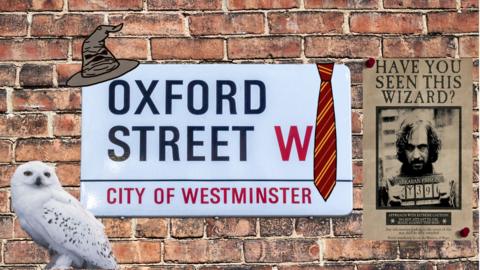 Oxford Street sign with Harry Potter themed items such an a white owl, a wanted poster for Sirius Black a Griffandor tie and sorting hat