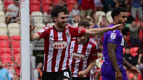 Ed Francis celebrates a goal