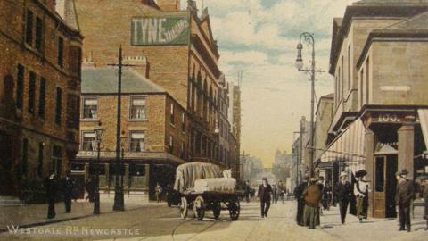 A painting of the theatre in 1906 with a horse and cart in the foreground and the streets full of people walking 