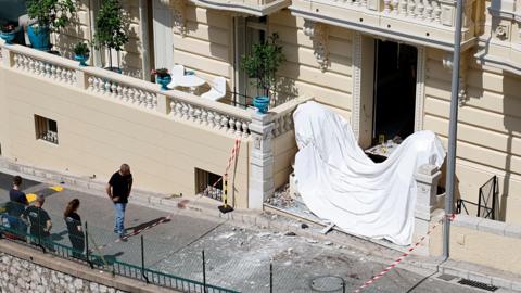 The entrance of a residential building in Monaco after a suspected parcel bomb explosion on 29 June, 2026.