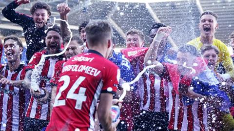 Lincoln celebrate promotion