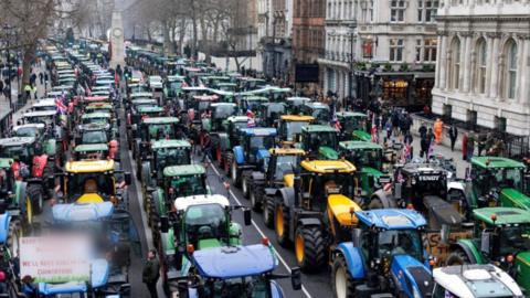 Hundreds of tractors block a road in Westminster