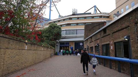 Chelsea fans walking towards Stamford Bridge