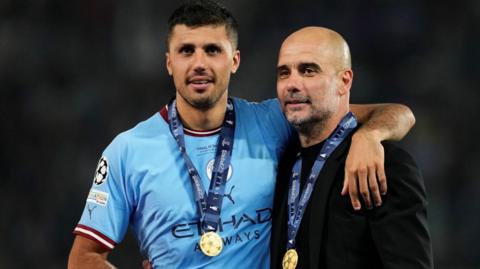 Rodri and Pep Guardiola