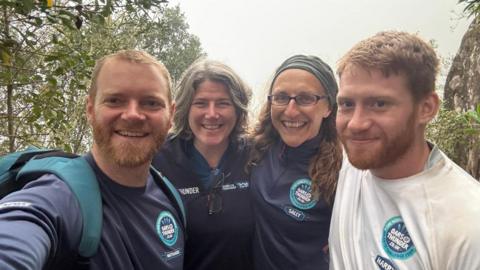 The four-strong team are taking a group selfie and standing in a wooded area. Each member is wearing a t-shirt with their team logo on it.

Oars Of Thunder was comprised of champion gig rowers (l-r) Nathaniel Rothwell, Kim Tolfrey, Sally Crabb and Harry Poulson