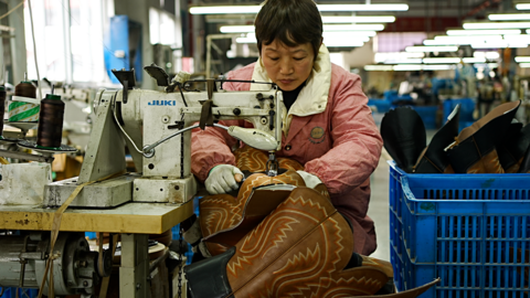 A worker at the factory