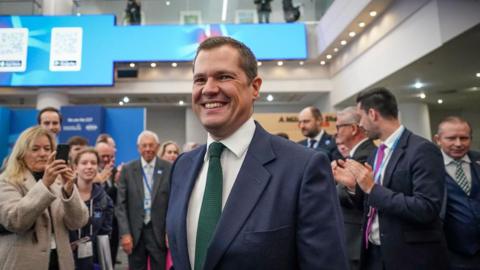 Robert Jenrick leaving the main hall after giving his speech on the final day of the Conservative conference in Birmingham