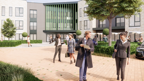 The apartment buildings are built out of brick with various cladded sections. A large brick forecourt has various young people in working clothes talking to each other. Greenery has been planted around the buildings.