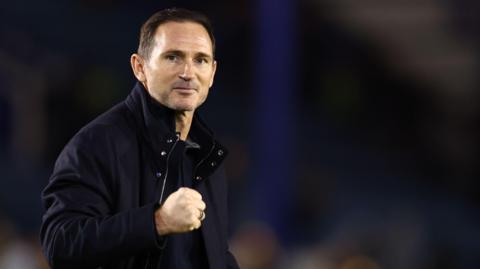 Frank Lampard pumps his fist to celebrate victory for Coventry over Portsmouth