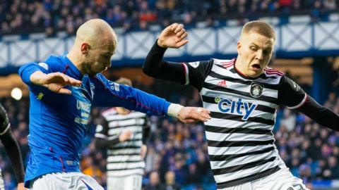 Rangers' Vaclav Cerny tries to put in a cross under pressure from Queen's Park's Ryan Duncan during a Scottish Gas Men's Scottish Cup match between Rangers and Queen's Park at Ibrox Stadium, on February 09, 2025, in Glasgow, Scotland.