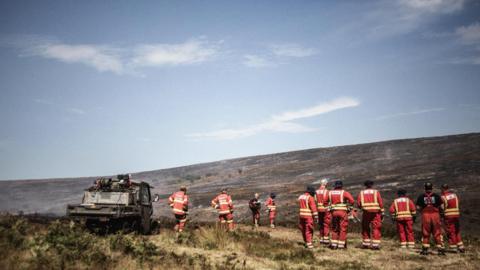 Firefighters on a moor