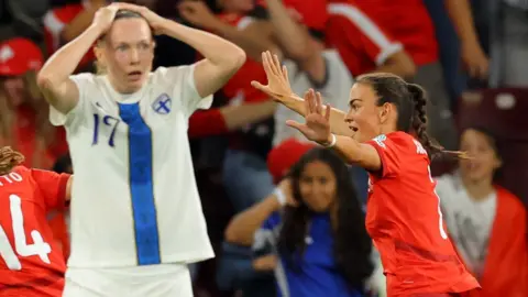 Switzerland's Riola Xhemaili celebrates scoring their first goal against Finland
