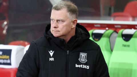 Mark Robins in the Stoke dugout