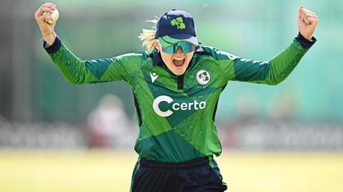 Gaby Lewis celebrates