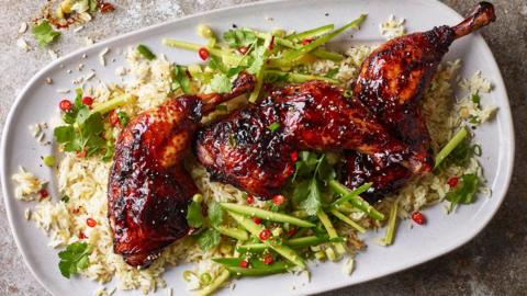 Honey soy chicken with garlic rice and cucumber slaw.
