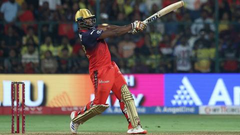 Romario Shepherd in batting action