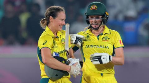 Australia players celebrate victory