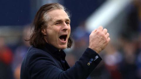 Gareth Ainsworth celebrates Shrewsbury's win over Birmingham