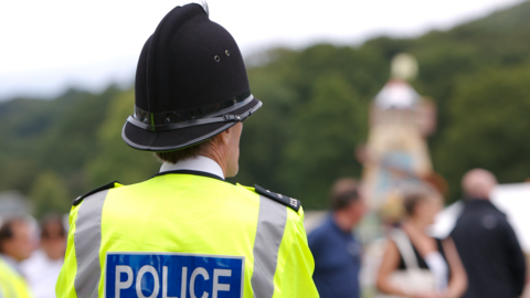 A police officer in hi vis