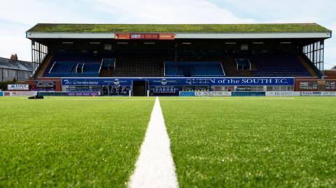 A view of Queen of the South's main stand at Palmerston Park