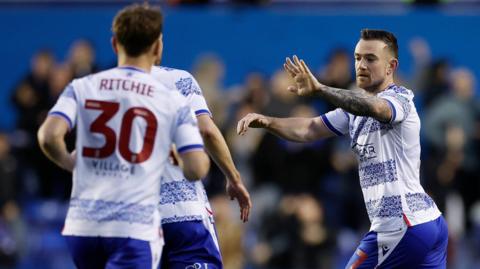Reading's Jack Marriott celebrates his later equaliser against Barnsley