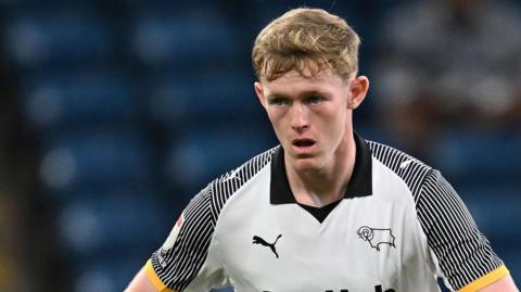 Jake Rooney in action for Derby County