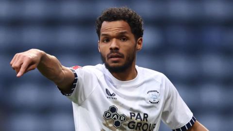 Duane Holmes gesturing to his team-mates during a Preston match.