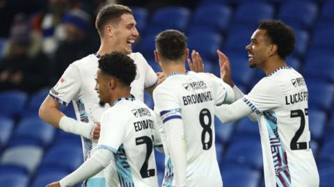 Burnley players celebrate with goalscorer Maxime Esteve