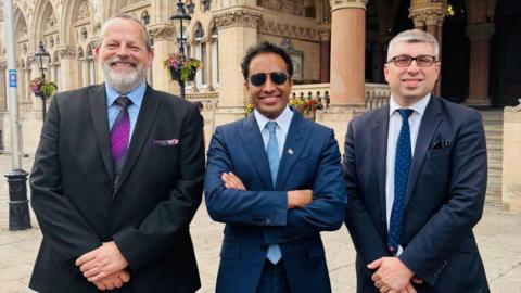 Zia Yusuf with Council Leader Mark Arnull, Deputy Leader James Petter and the Reform UK cabinet on West Northamptonshire Council