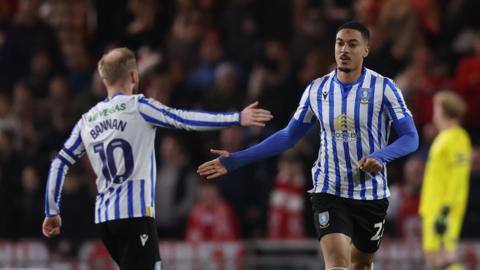 Yan Valery is congratulated by Sheff Wed captain Barry Bannan for his goal 