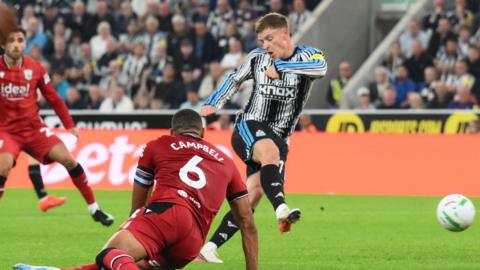 Harvey Barnes leaves West Brom captain George Campbell on his backside as scores the first of his two goals for Newcastle