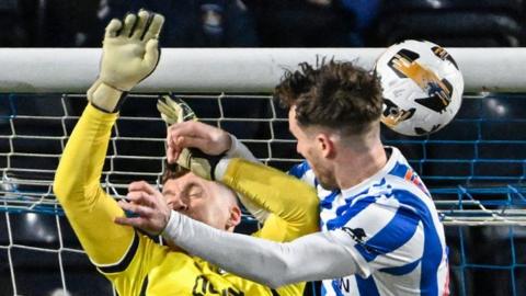 Dundee United goalkeeper Jack Walton and Kilmarnock forward Marley Watkins