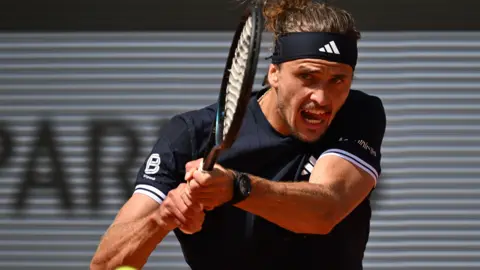 Alexander Zverev hits a backhand