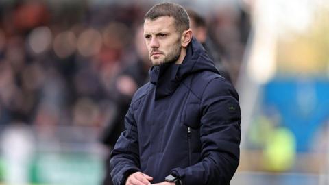 Luton Town manager Jack Wilshere watches his team in action