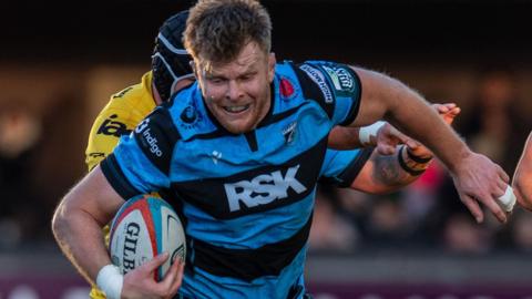Josh McNally carries the ball for Cardiff