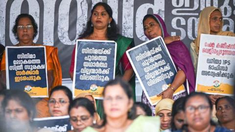 Women of the Mahila Congress in Kerala sitting in protest against the sexual abuse reported in the Malayalam film industry